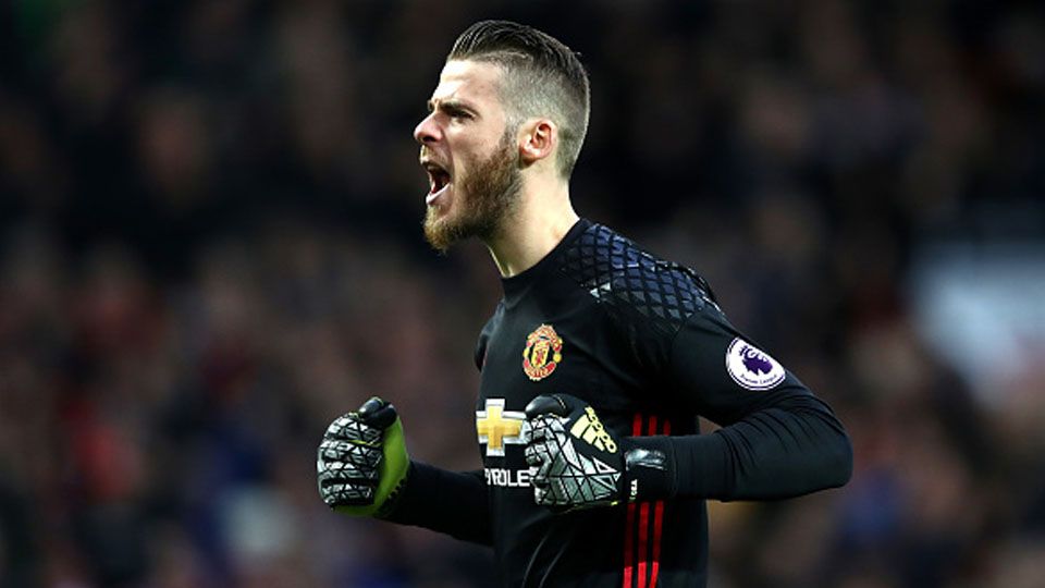 David De Gea mencapai 250 penampilan usai melawan West Ham United. Copyright: © Clive Brunskill/Getty Images